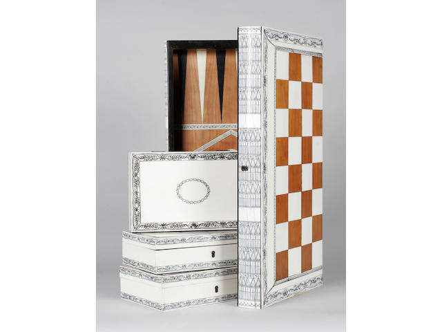 An Indian ivory, sandalwood and ebony chess board/games box