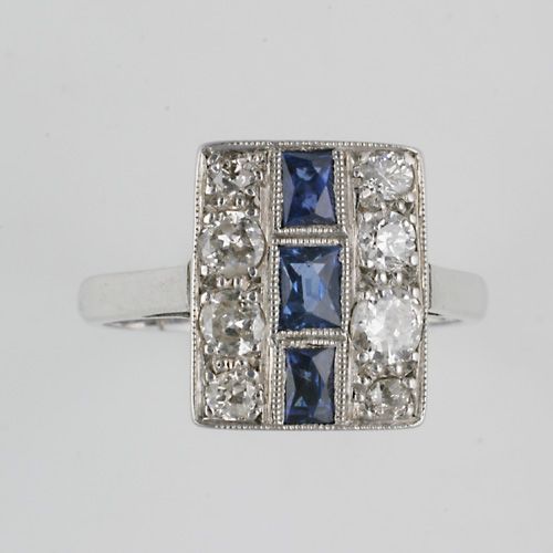 A diamond and sapphire rectangular plaque ring