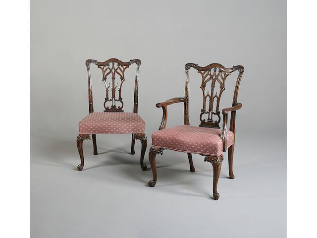 A set of fifteen mahogany dining chairs