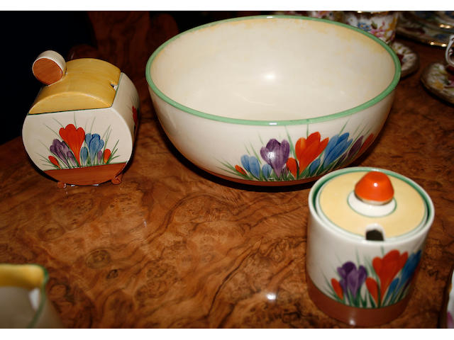 A Clarice Cliff `Crocus' pattern preserve jar and cover,