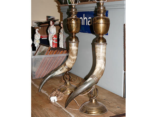 A pair of large horn bodied and brass mounted table lamps