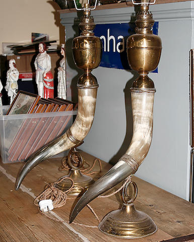 A pair of large horn bodied and brass mounted table lamps