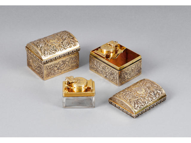 Two George IV silver-gilt casket shaped toilet boxes, by John Reily, London 1824,