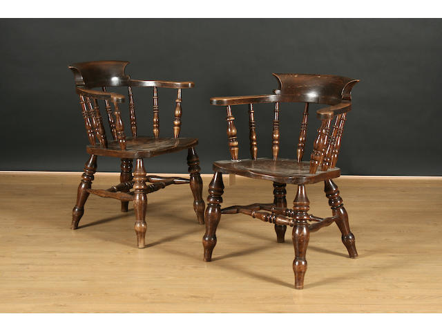 A pair of late 19th Century elm, ash and fruitwood 'Captain's chairs', stamped ALSOP