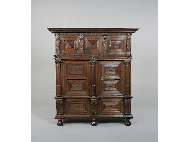 An early 17th century Flemish oak kast in three sections