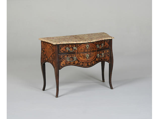 An 18th century Dutch floral marquetry serpentine commode in the Louis XV style