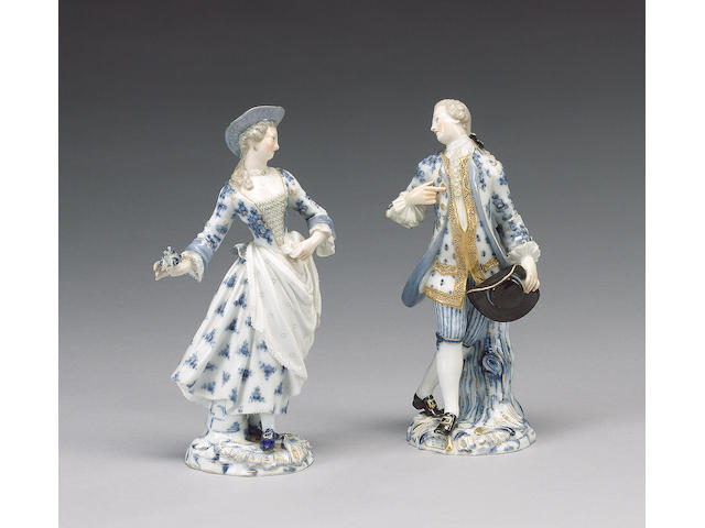 A pair of Meissen figures of a dandy and companion, circa 1870