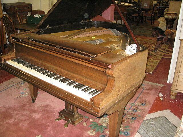 A mahogany cased Chappell baby grand piano