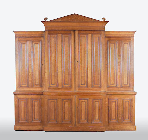 A mid Victorian oak breakfront cabinet bookcase of architectural form