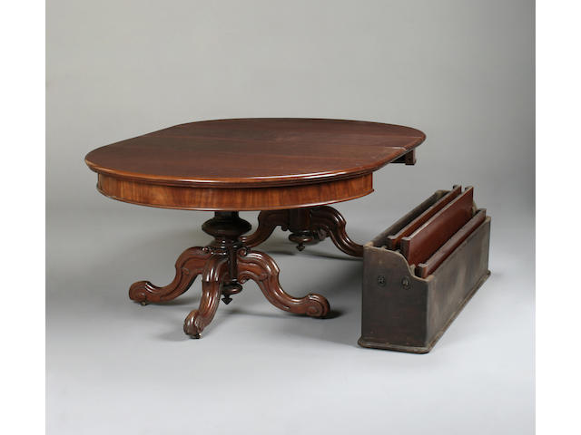 A Victorian mahogany twin pillar extending dining table