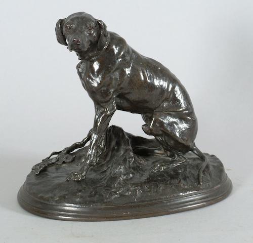 A late 19th Century cast iron model of seated hound