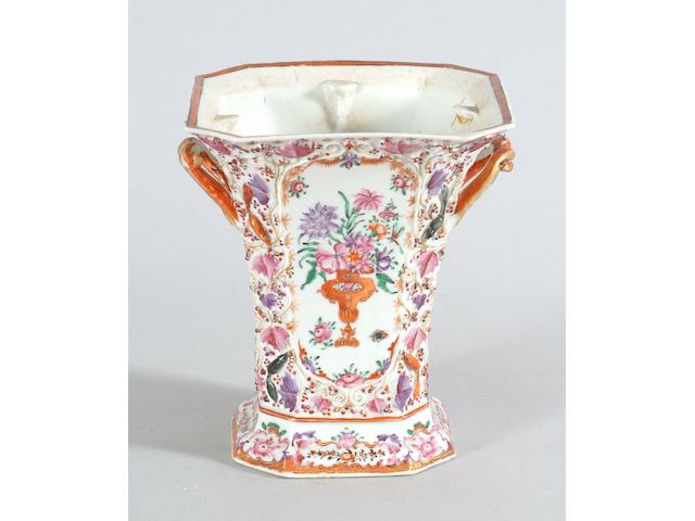 A cantonese bough pot and a pair of Japanese imari vases.