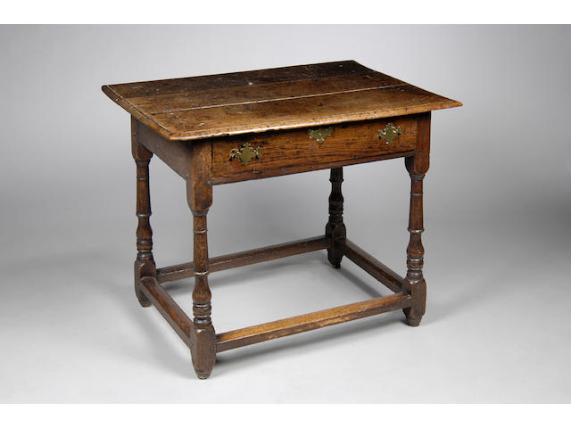 An early 18th century oak side table