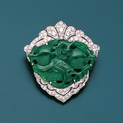 Bonhams : An art deco jade and diamond clip brooch,