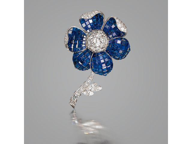 A fine diamond and sapphire floral brooch,