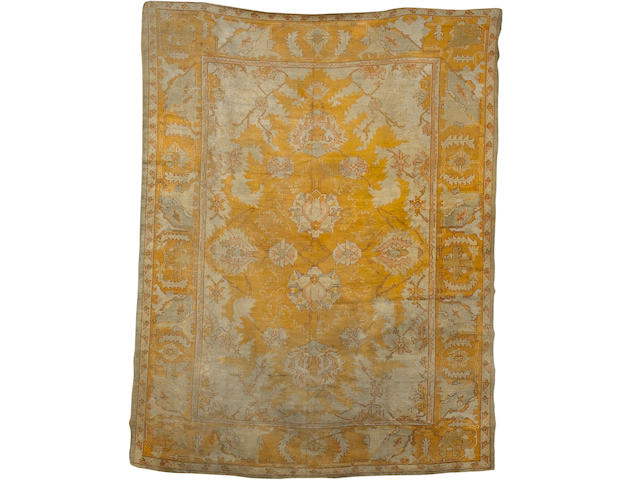 An Ushak carpet West Anatolia, 14 ft 2 in x 11 ft (431 x 335 cm) some wear