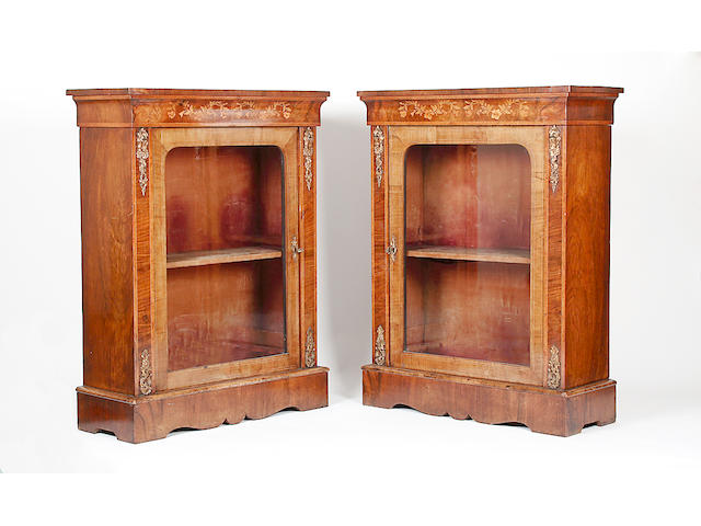 A pair of mid Victorian walnut display cabinets
