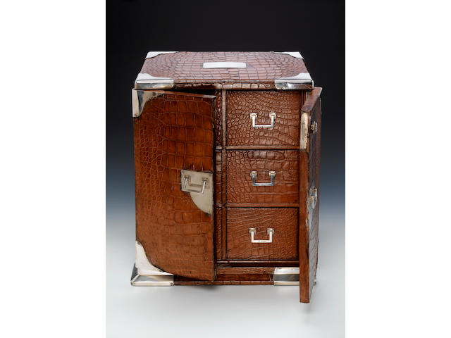 A Victorian crocodile leather and silver-mounted table humidor of large size, by George Henry James, London 1884,