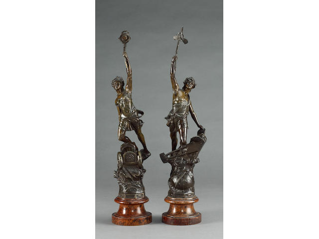 A pair of allegorical figures 'Automobilie' and 'Aviation' by Ferrand, circa 1907,