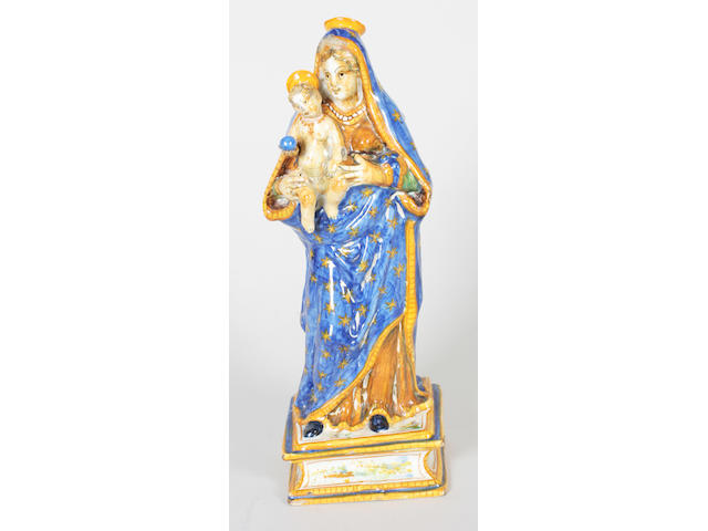 An Italian faience figure of Madonna and child