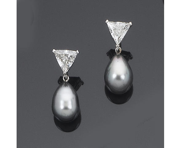A pair of diamond and cultured pearl pendent earrings