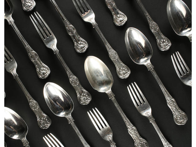 A Victorian Queens pattern, with honeysuckle heel, canteen of cutlery for twelve settings by George Adams, 1864,