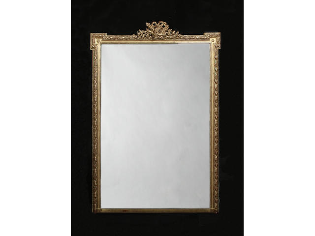 A Louis XVI style gilt overmantle mirror