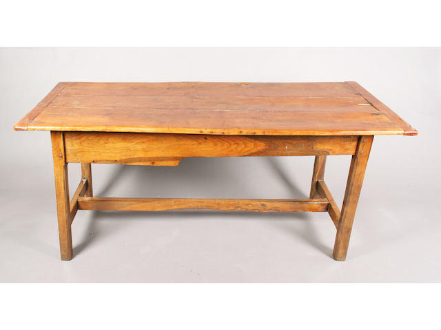 A 19th century mixed wood farmhouse rectangular table