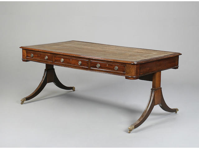 A large Regency style mahogany partners library table