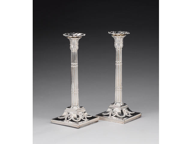 A pair of George III silver candlesticks, by Henry Tudor & Thomas Leader, Sheffield 1777, sconces stamped with lion passant only,  (2)