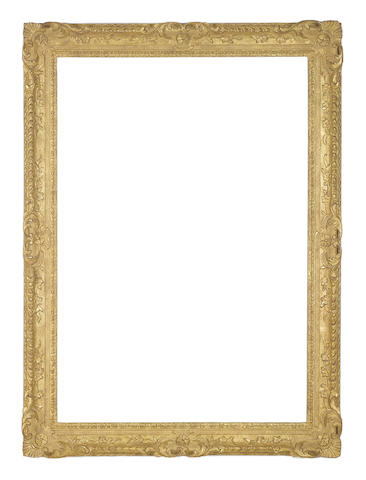 An English 18th Century carved, pierced and gilded frame