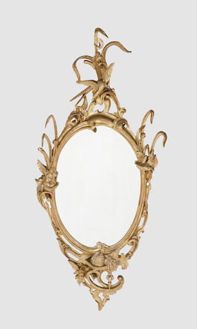 An early 19th century carved giltwood pier mirror