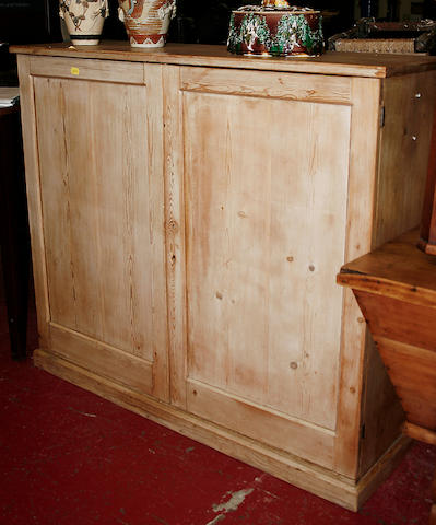 A 19th Century stripped pine cupboard