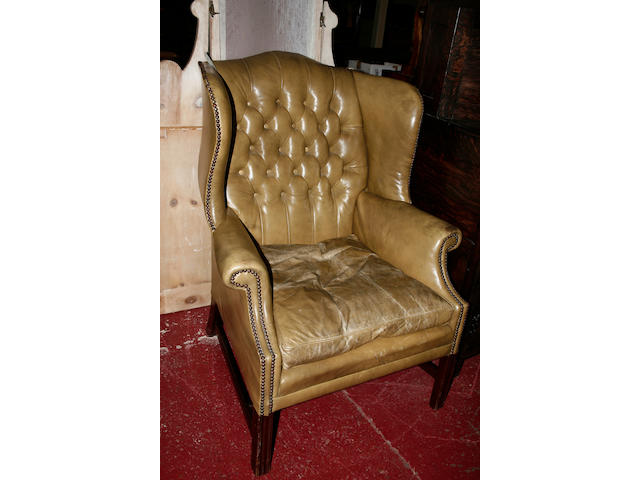 A George III style mahogany framed leather upholstered armchair