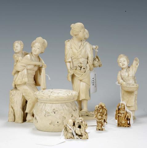 An ivory okimono of mother and child Meiji period