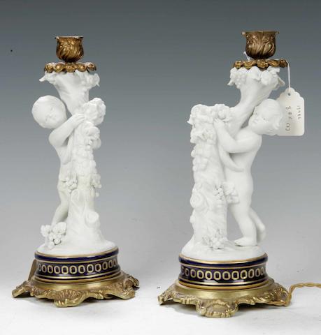 A pair of late 19th century/early 20th century French table lamp bases