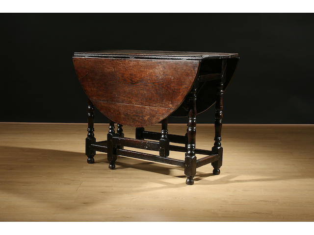 An early 18th Century oak gateleg table