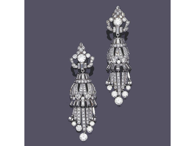 A pair of diamond pendent earrings,