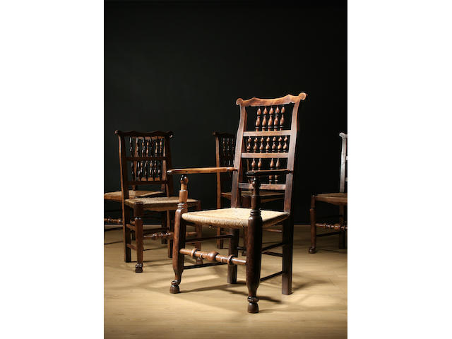 A set of five ash and birch spindle back chairs