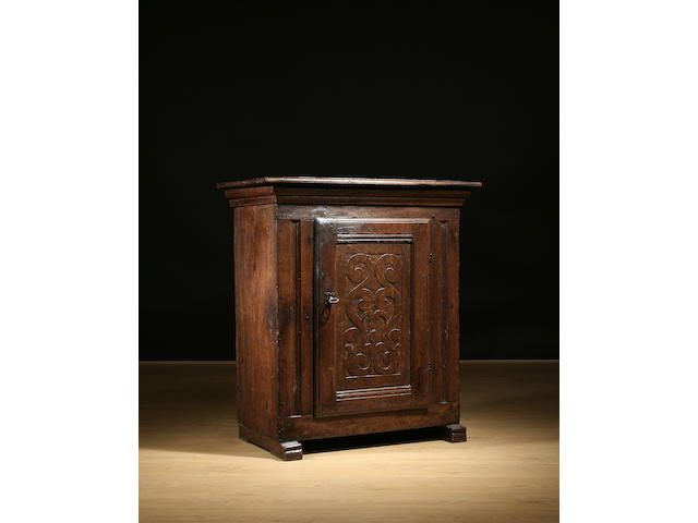 A 17th Century and later oak side cabinet, Northern European