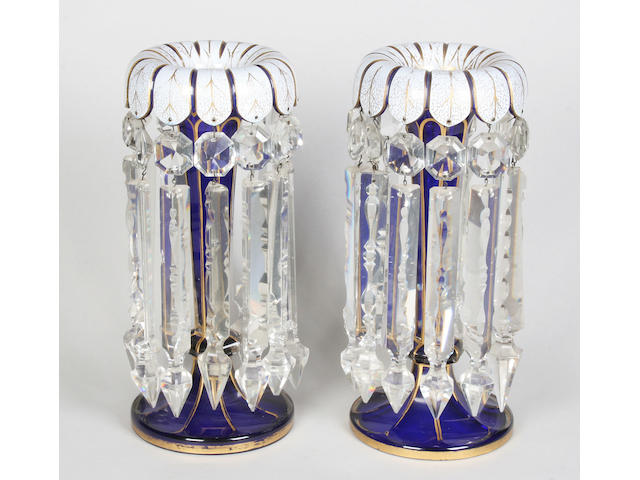 A pair of Bohemian blue and white overlay glass table lustres