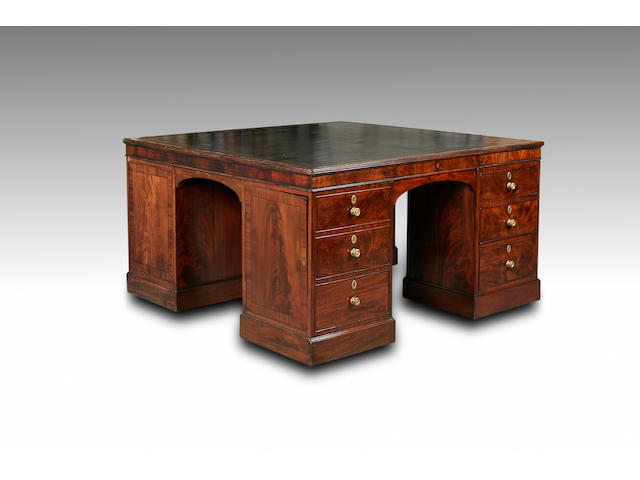 A Regency four pedestal mahogany desk