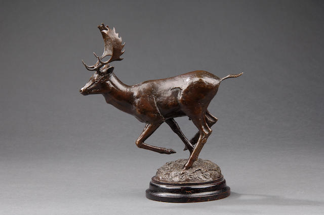 Geoffrey Dashwood (British, born 1947: A bronze model of a running stag