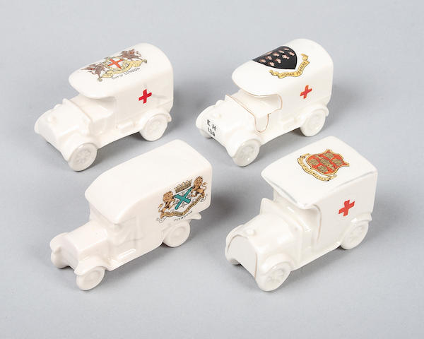 Four World War One Red Cross vehicles and ambulances