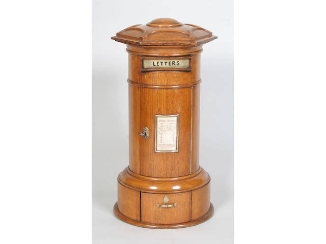 A Victorian country house table top oak pillar box