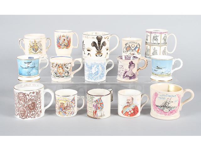 An assortment of commemorative mugs