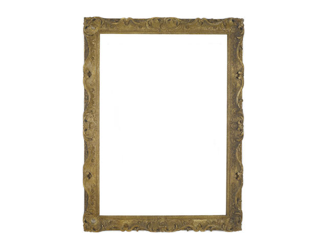 An English mid 18th Century carved, pierced, swept and gilded frame