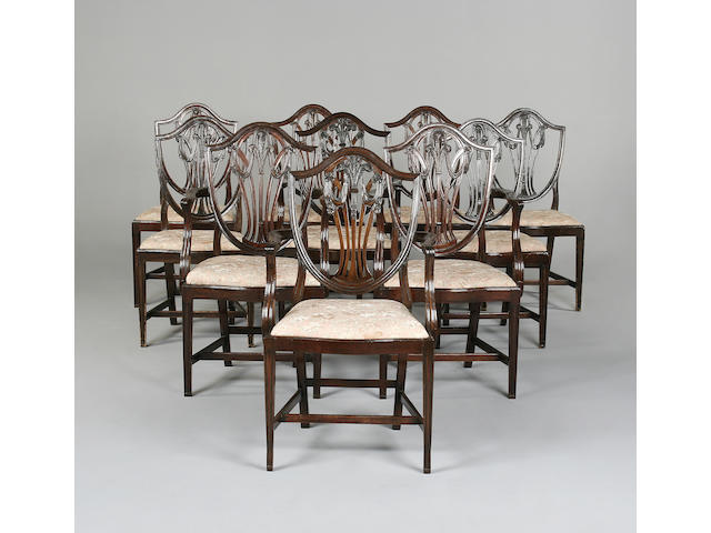 A set of ten mahogany Hepplewhite style dining chairs