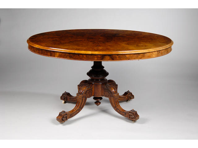 A Victorian walnut oval Loo table,
