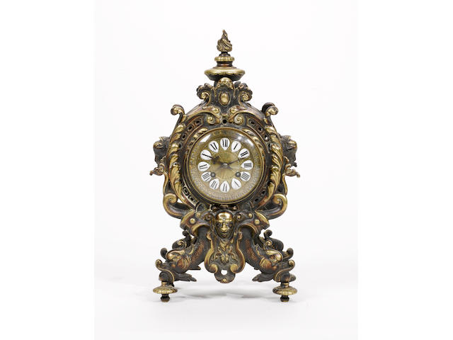 A late 19th Century brass French mantel clock,